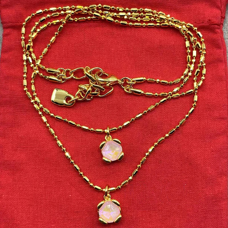 Jewelry Handmade Se . Necklaces and bracelets in gold/silver tones with crystal pendants and chain designs.