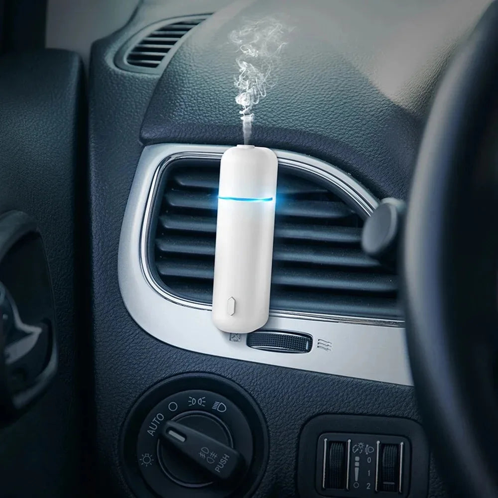 Car Air Freshener Perfume Vent Clip Electric Aroma Diffuser Cordless with 6 Scents Small Portable Gifts Essential Oil Diffuser